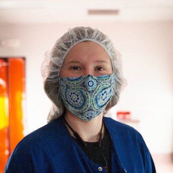 Portrait of woman with mask and protective gear