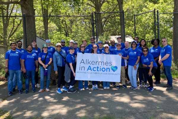 group of Alkermes in action employees showing their work